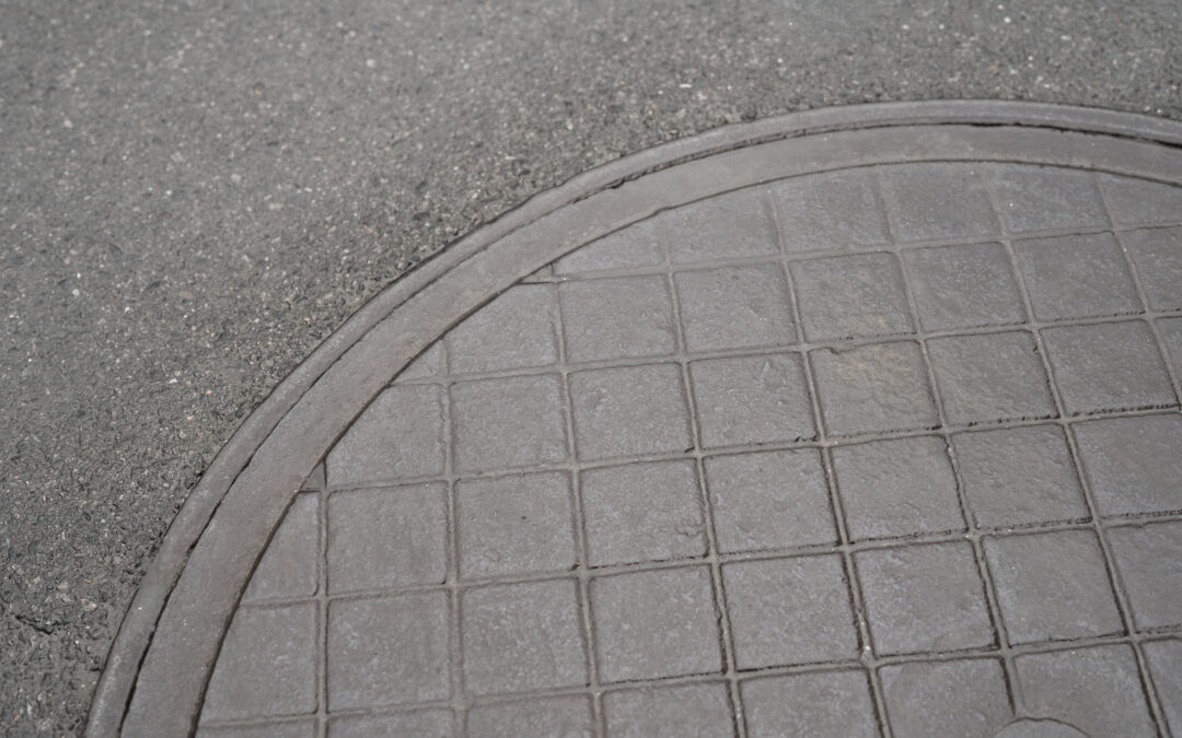 outdoors cobblestone texture with manhole scaled