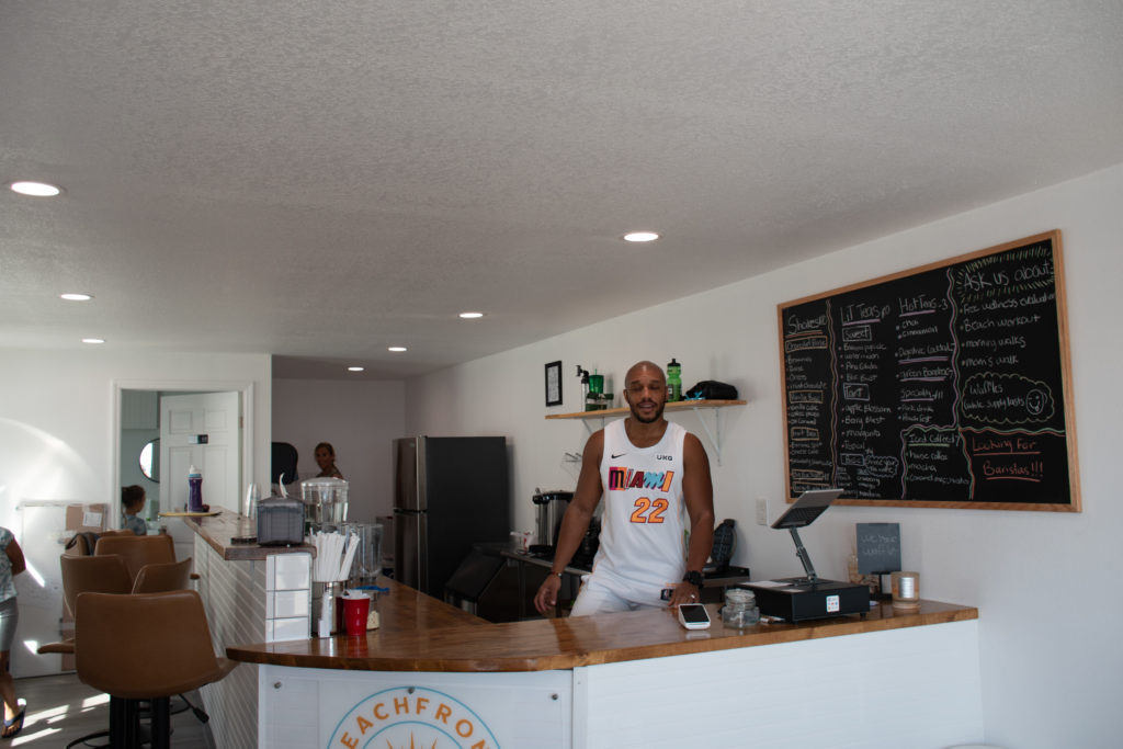 Raymond Hall behind the bar at Beachfront nutrition in Flagler Beach