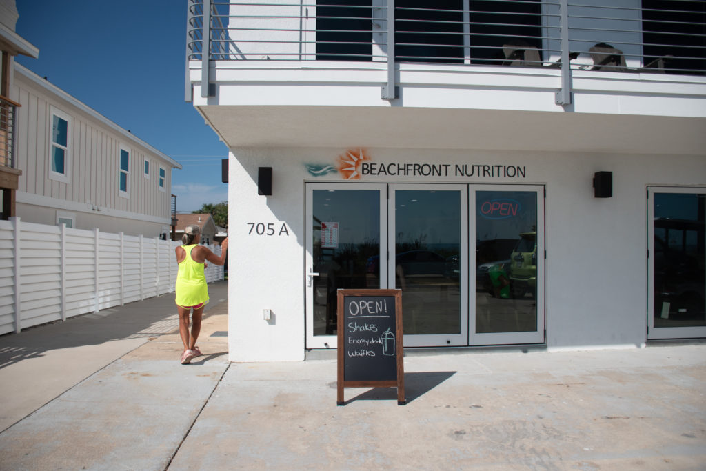 Customer walking into Beachfront Nutrition in Flagler Beach