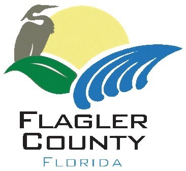 Flagler County logo featuring a stylized sun, a bird silhouette, green land, blue waves, and the text "Flagler County Florida