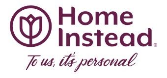 Logo for Home Instead featuring a stylized tulip inside a circle, followed by the text "Home Instead" in bold, dark red font Below, in a cursive style, is the phrase "To us, it’s personal