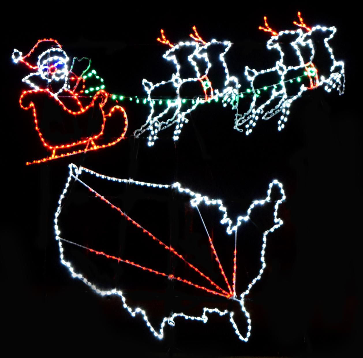 A festive display of Christmas lights shows Santa Claus in a sleigh pulled by four reindeer Below, an outline of the contiguous United States is depicted with red lines extending from the center to various points The background is black