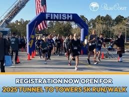 Participants running under a large finish line arch at a K event A U S flag hangs nearby, and people are visible in the background Text on the image announces the Tunnel to Towers K Run/Walk with registration open now